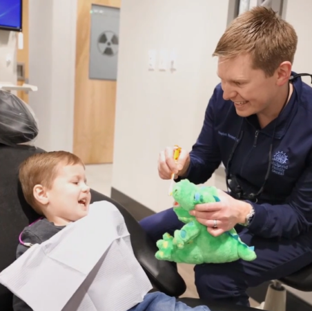 Dr. Harward with a young patient